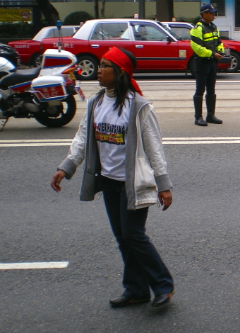 Eni's experiences in Hong Kong have made her a leader. She is pictured here marching at the front of a demonstration in 2009 / Wayne Palmer